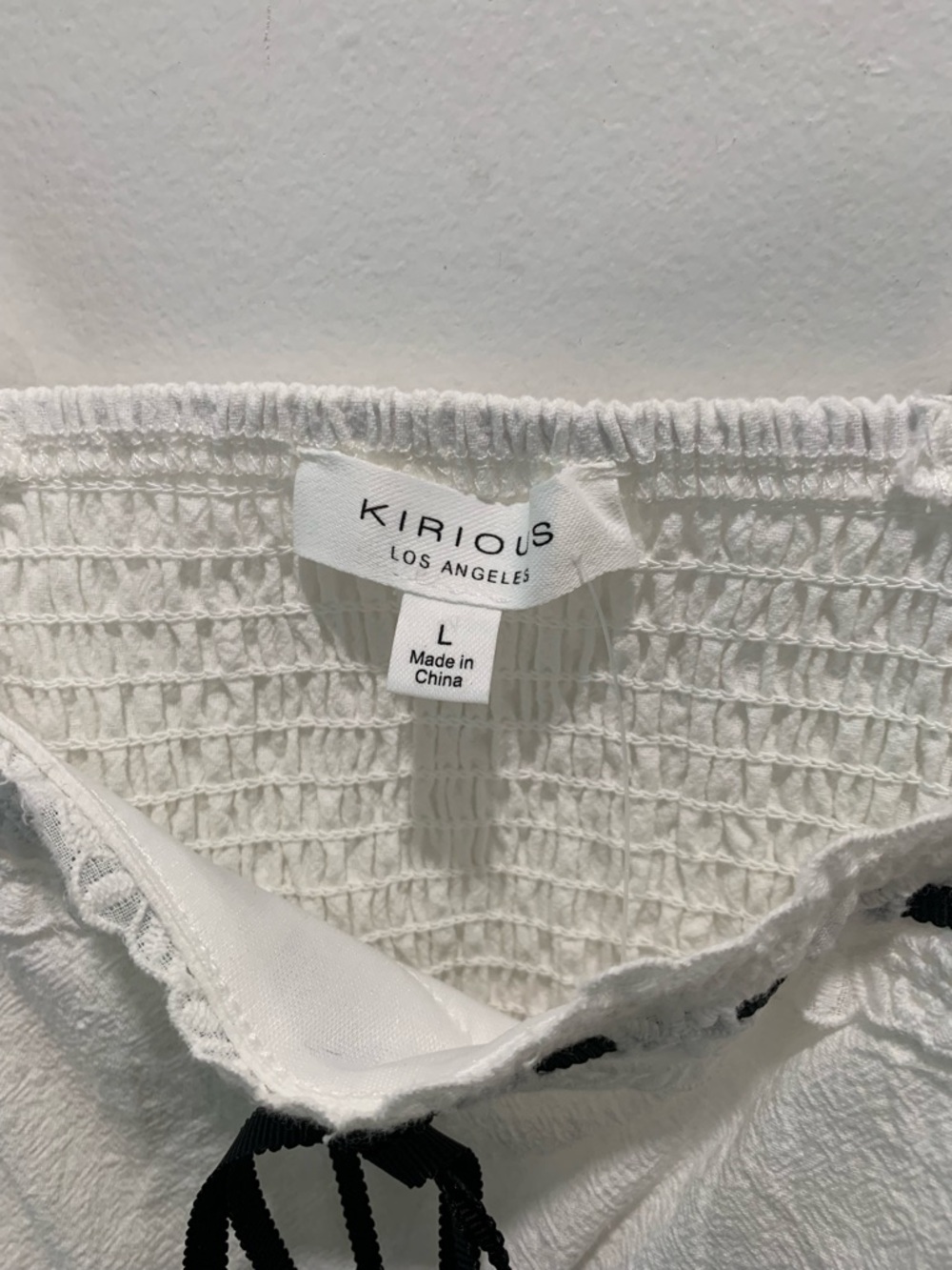 a Kirious Los Angeles Chic White Lace Trim Tank Top. - Picture 4 of 5